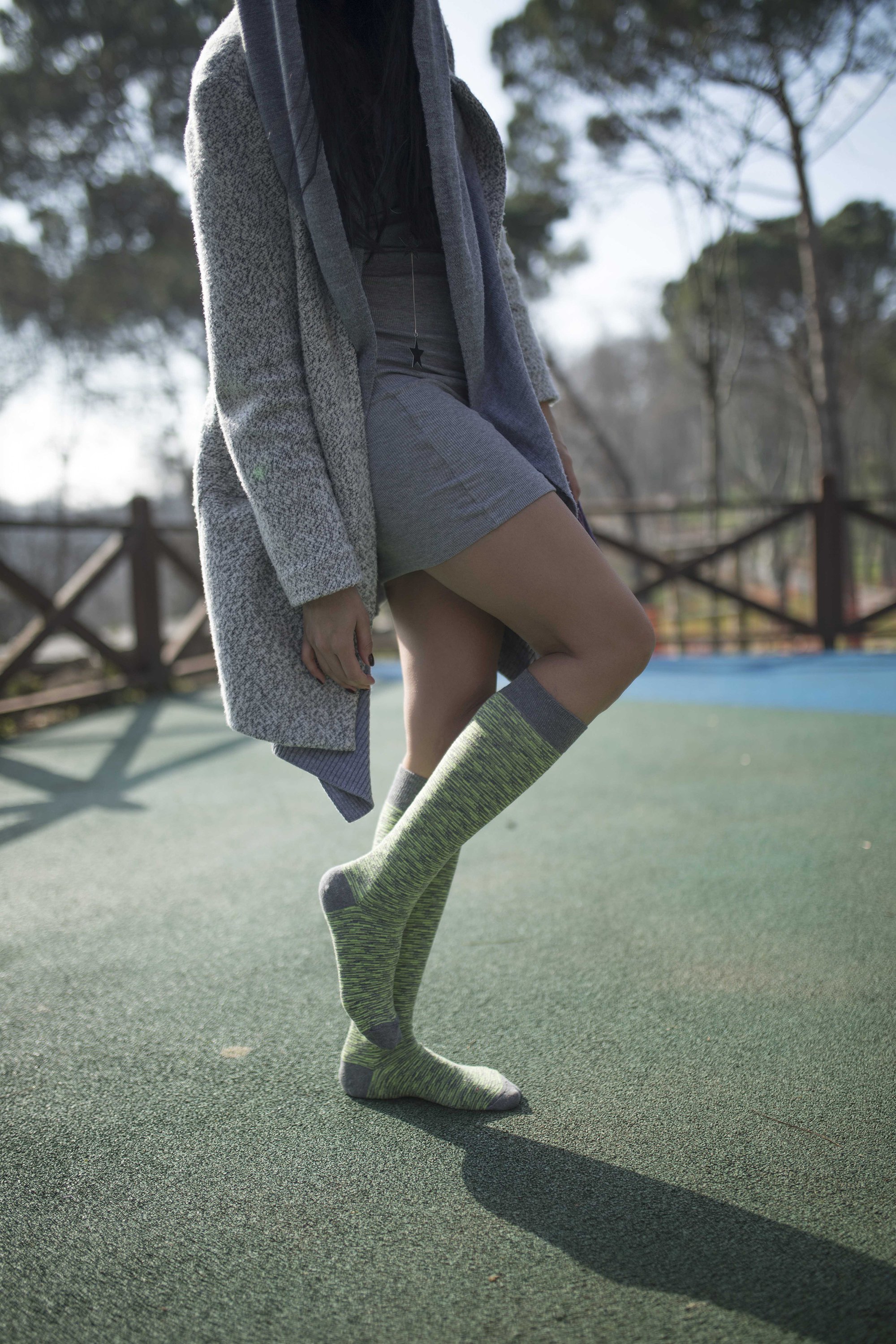 A pair of vibrant Women's Lime Grizzled Stripe Knee High Socks showcasing a colorful striped pattern, perfect for adding flair to any outfit.