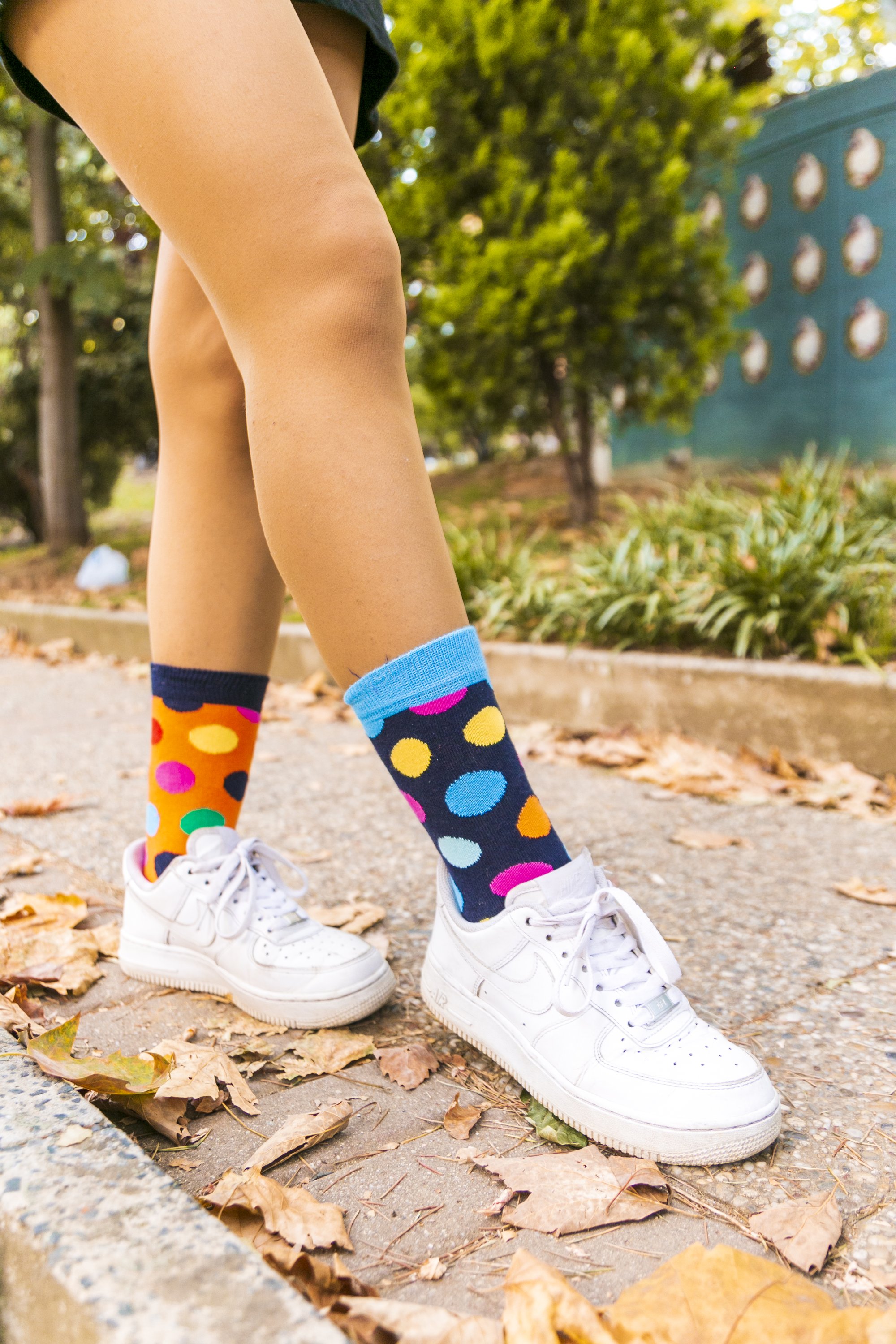 A pair of Women's Mandarin Dot Socks featuring colorful mandarin dot patterns, made from soft Turkish cotton for comfort.