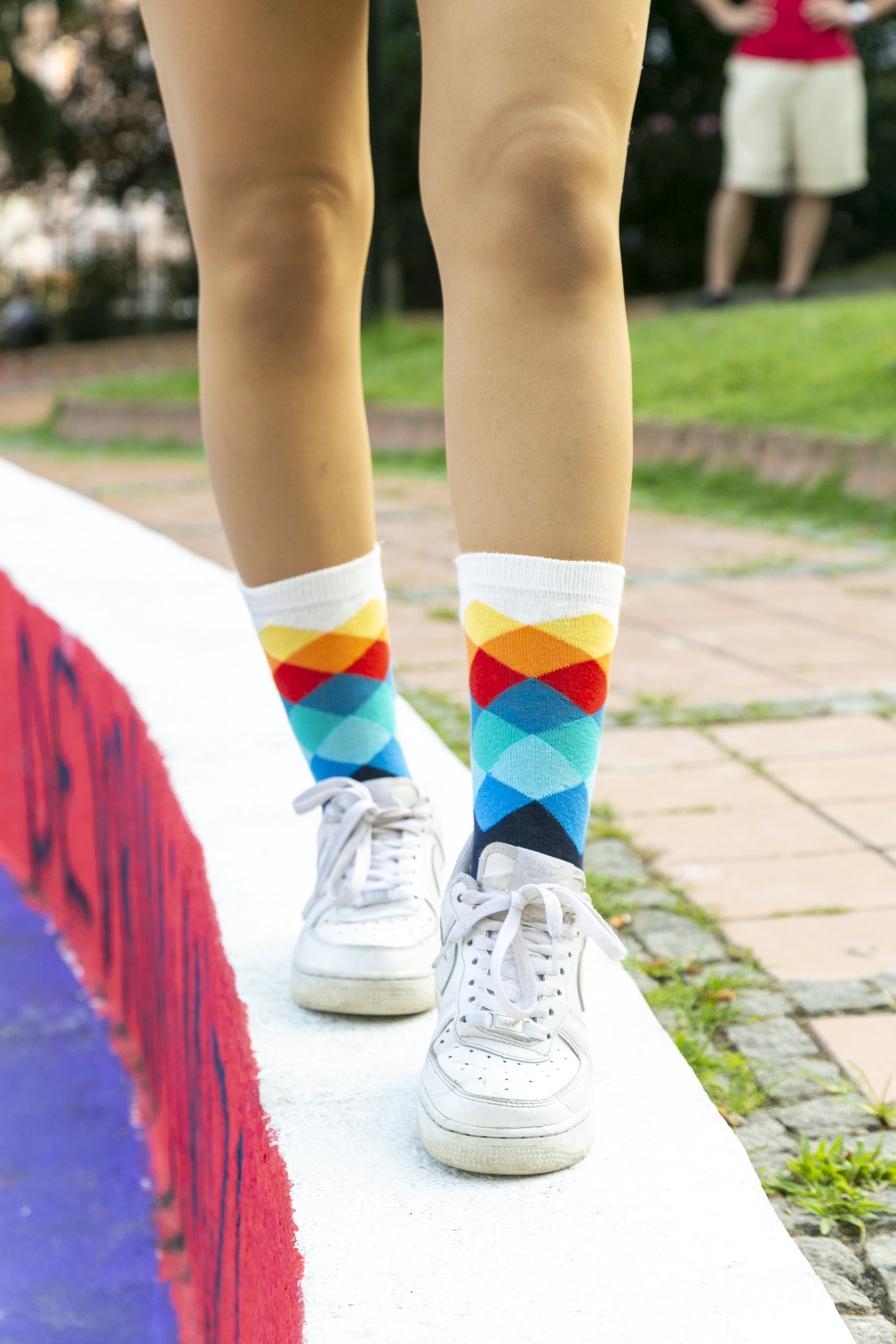 A pair of Women's Marine Diamond Socks featuring colorful patterns and soft cotton material, perfect for stylish comfort.