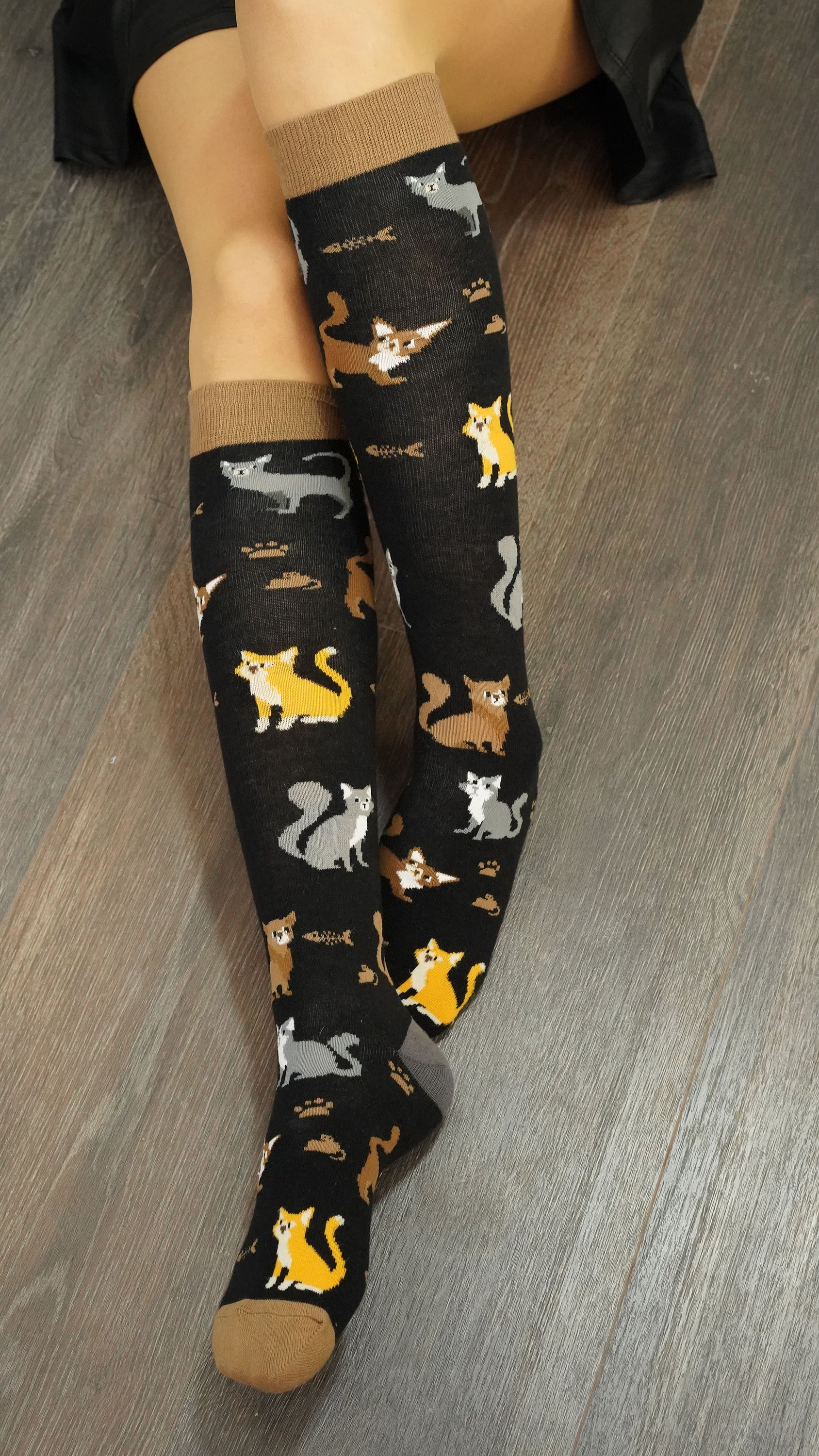 Colorful Women's Mrs. Kitty Knee High Socks featuring trendy patterns and premium cotton material for comfort.