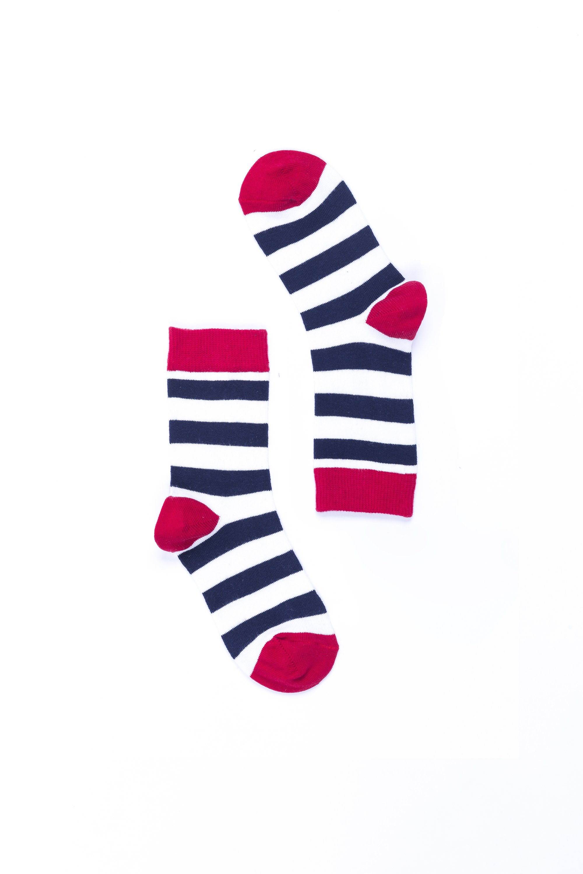 A pair of women's navy and white striped socks, showcasing a trendy design perfect for casual and formal wear.