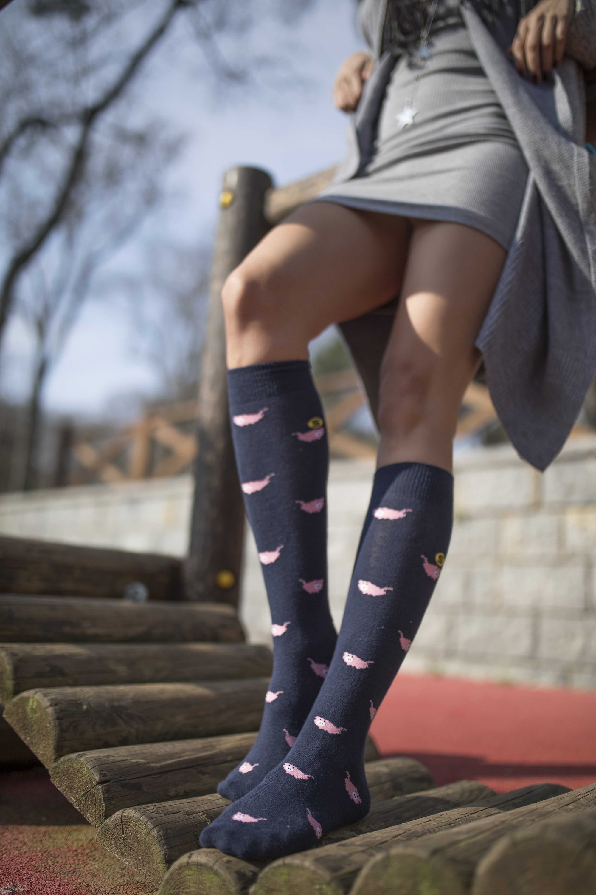 Colorful Women's Pig Knee High Socks featuring trendy patterns and soft fabric for comfort.