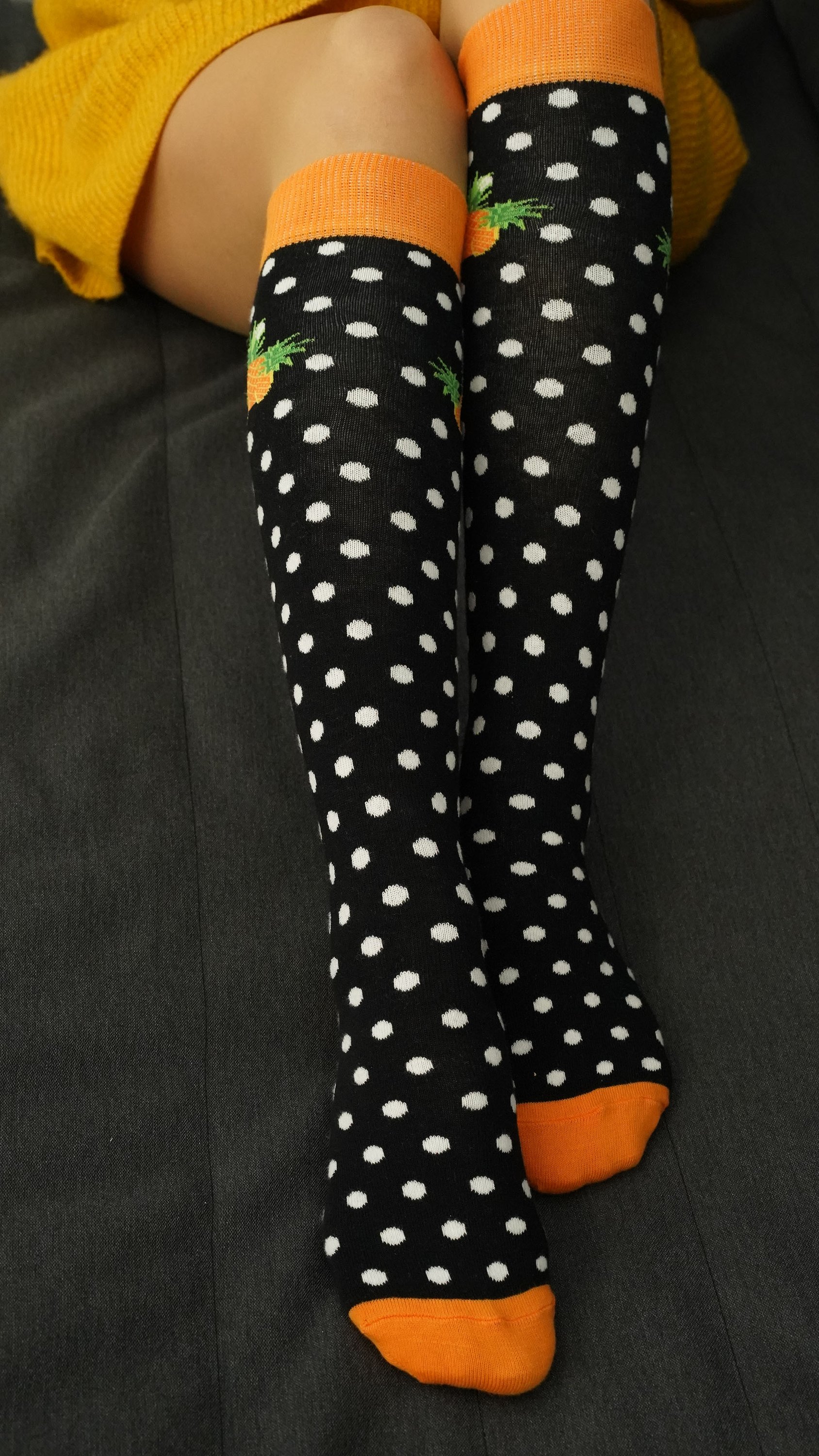 Colorful Women's Pineapple Dot Knee High Socks featuring a fun pineapple pattern, perfect for adding a stylish touch to any outfit.