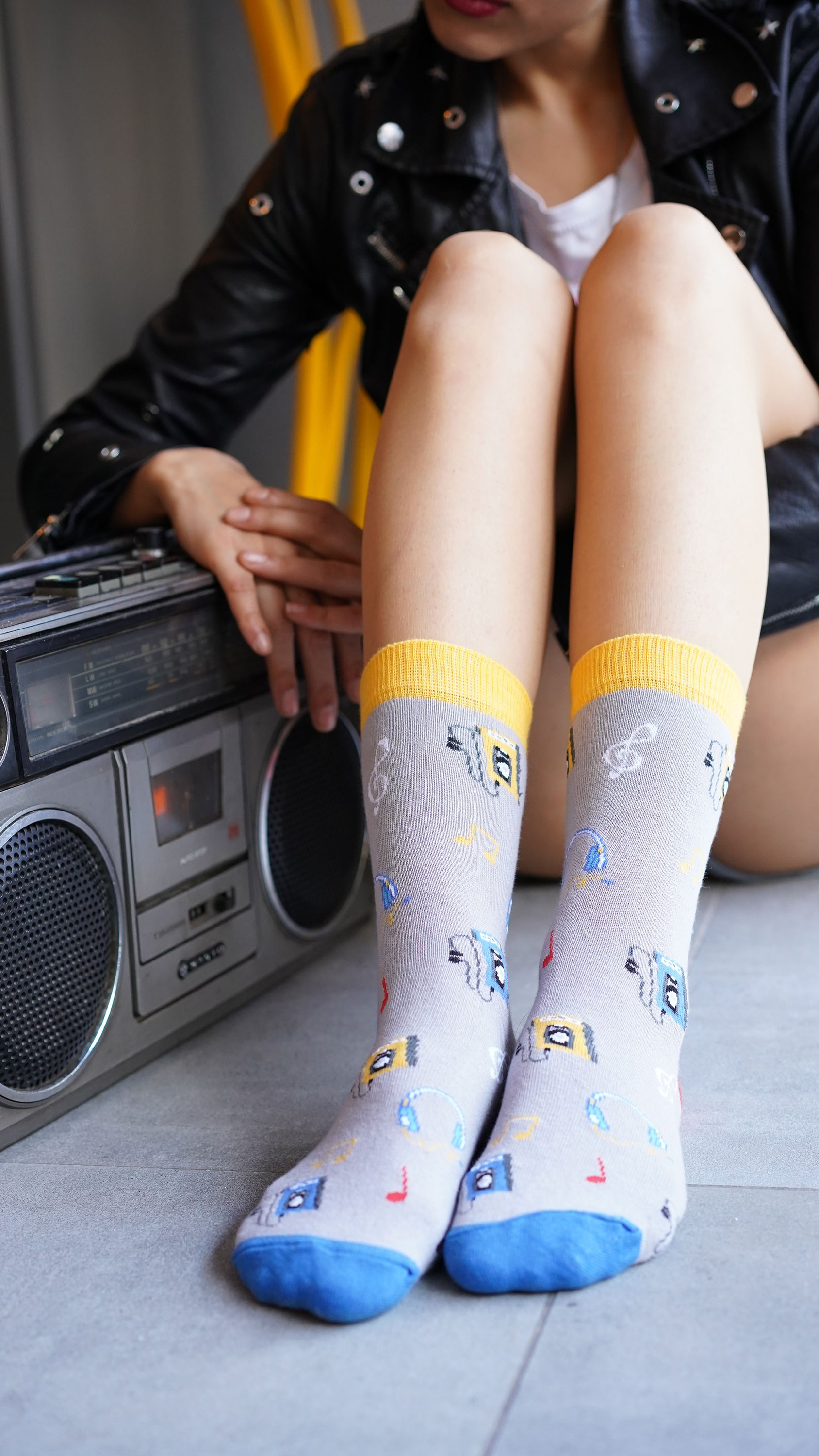 A pair of colorful Women's Radio Socks featuring trendy patterns and made from soft Turkish cotton, perfect for stylish comfort.