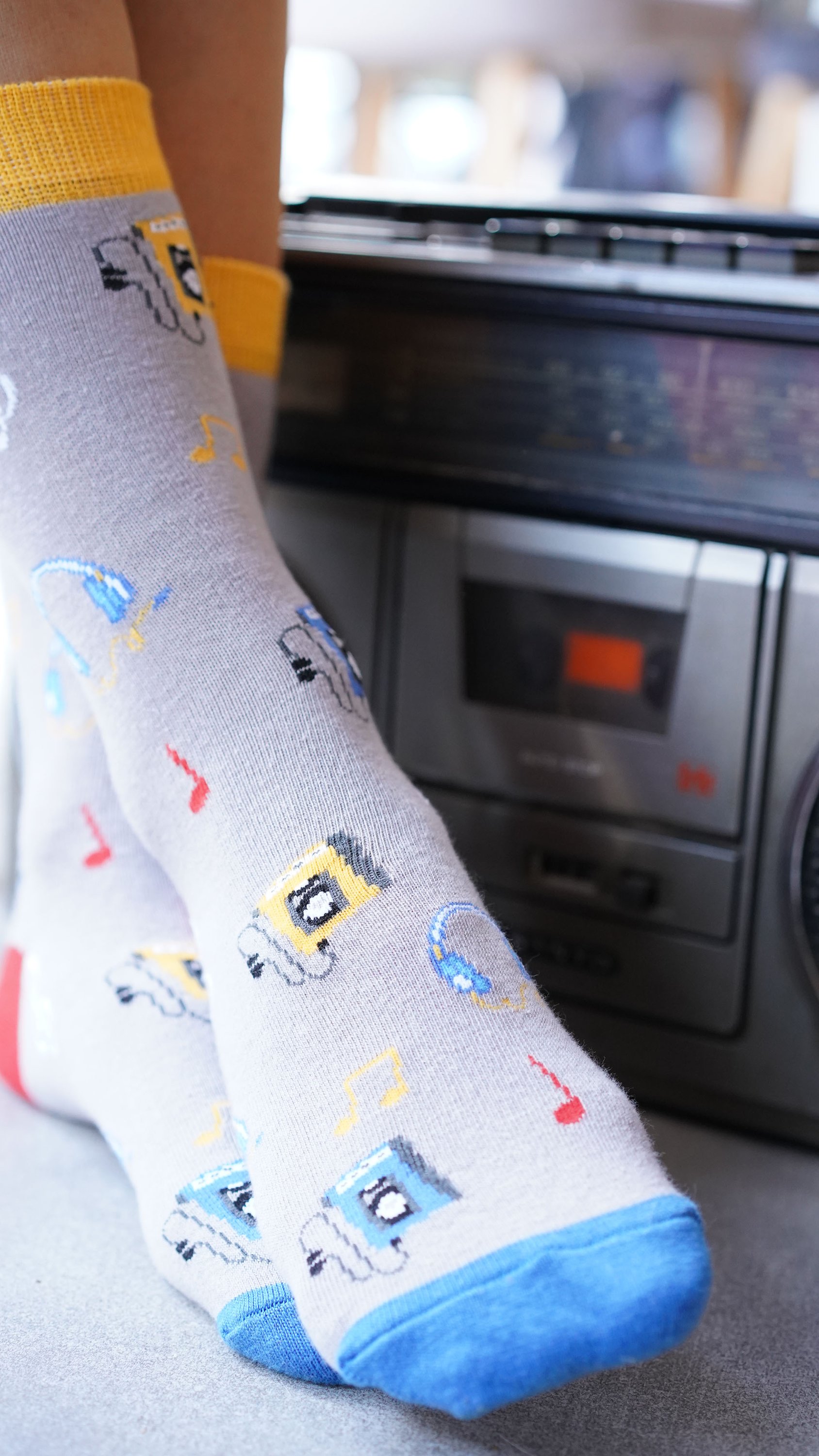 A pair of colorful Women's Radio Socks featuring trendy patterns and made from soft Turkish cotton, perfect for stylish comfort.