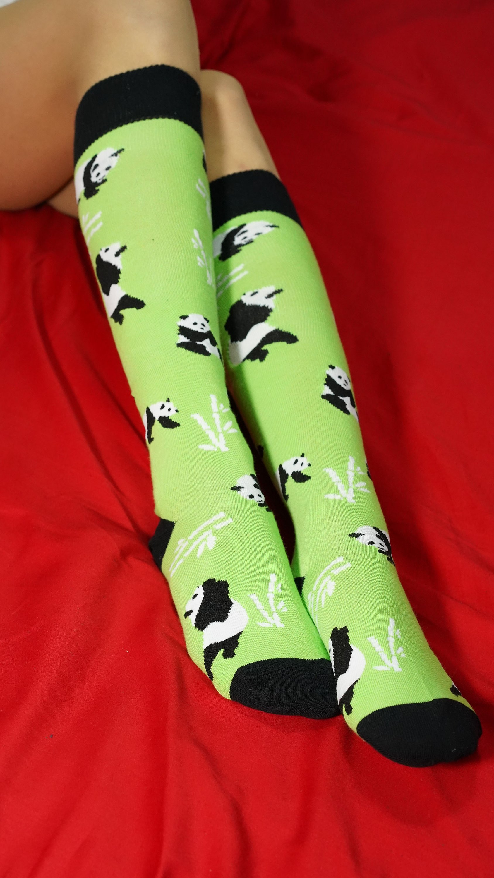 Colorful Women's Silly Panda Knee High Socks featuring playful panda designs, made from soft Turkish cotton for comfort.