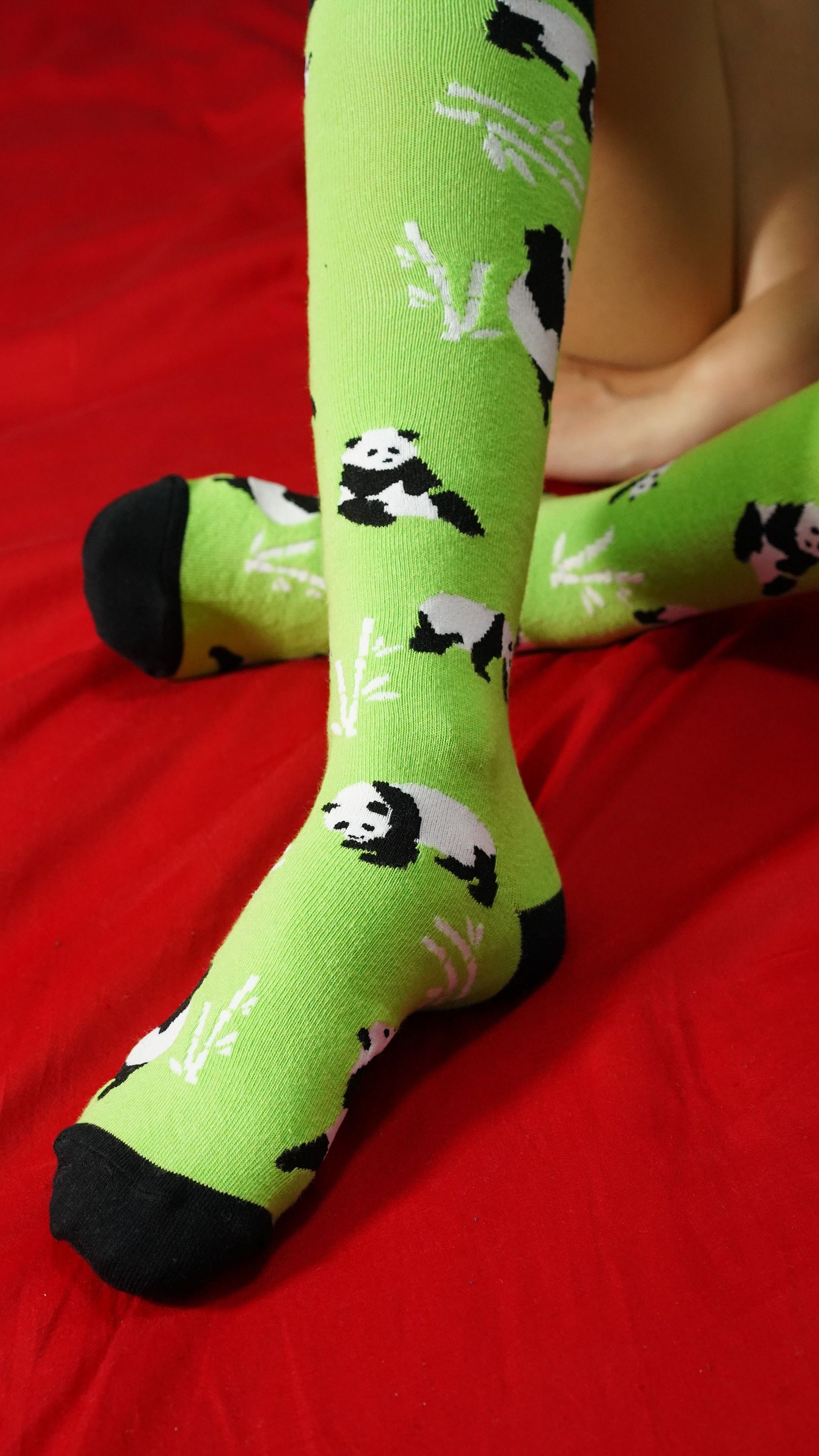 Colorful Women's Silly Panda Knee High Socks featuring playful panda designs, made from soft Turkish cotton for comfort.