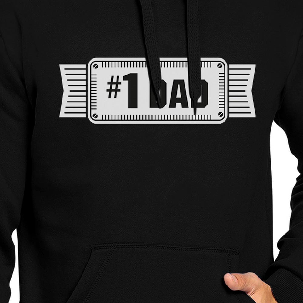 A stylish black hoodie with '#1 Dad' printed on it, designed for men, showcasing comfort and unique design.