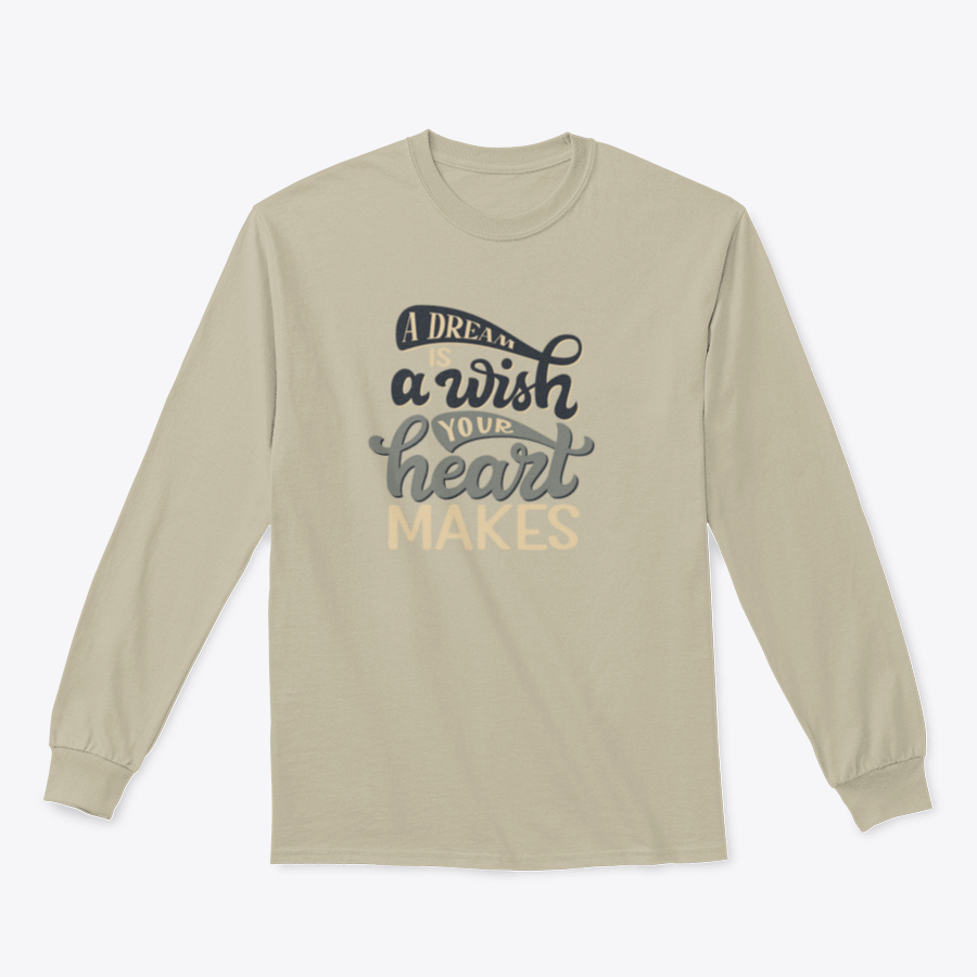 A comfortable t-shirt featuring the hand-drawn quote 'A Dream Is A Wish Your Heart Makes' in an elegant design.