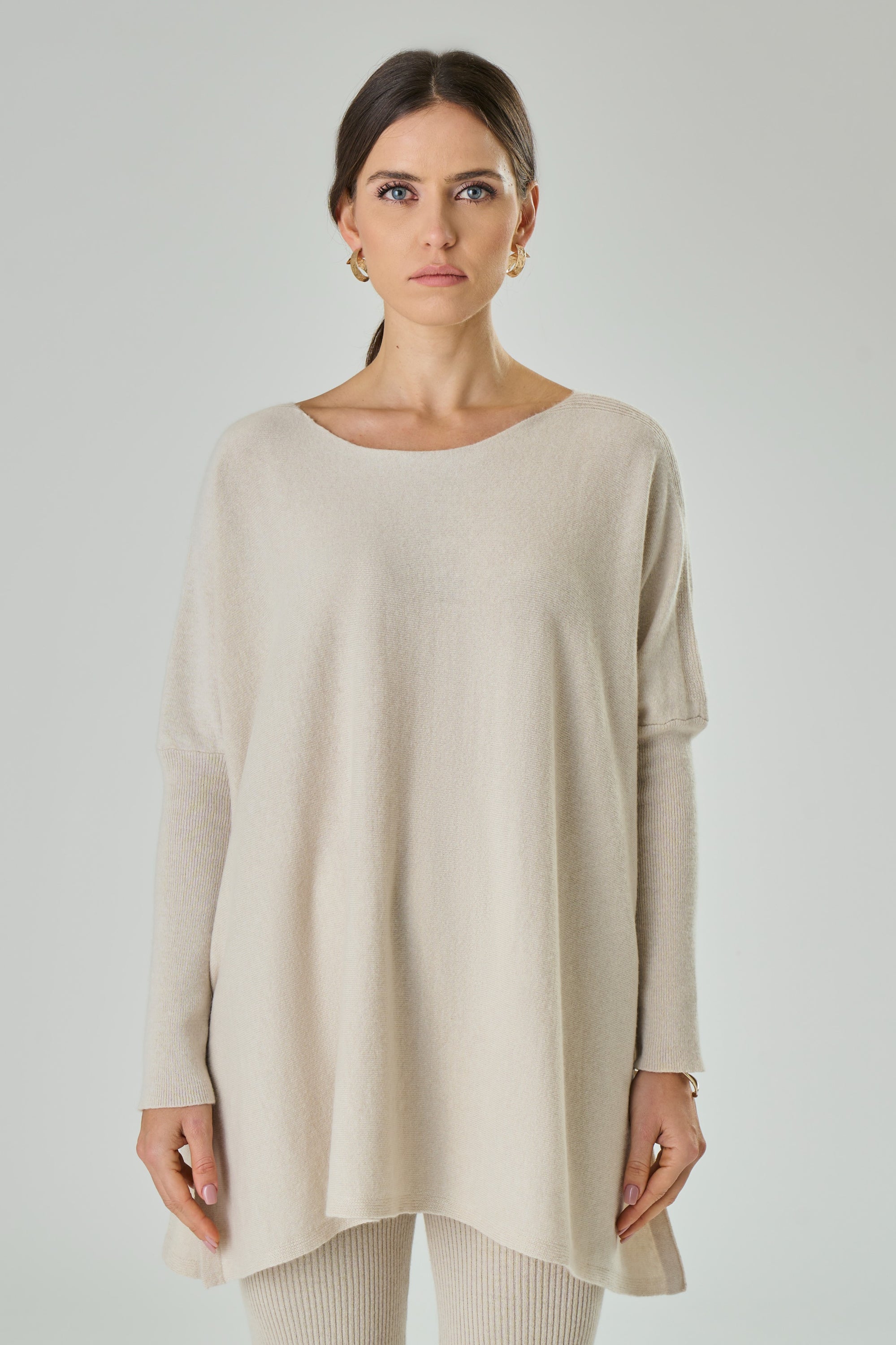 Alyssa Crew Neck Sweater in a stylish design featuring ribbed sleeves and a classic crew neck, made from a luxurious cashmere and wool blend.