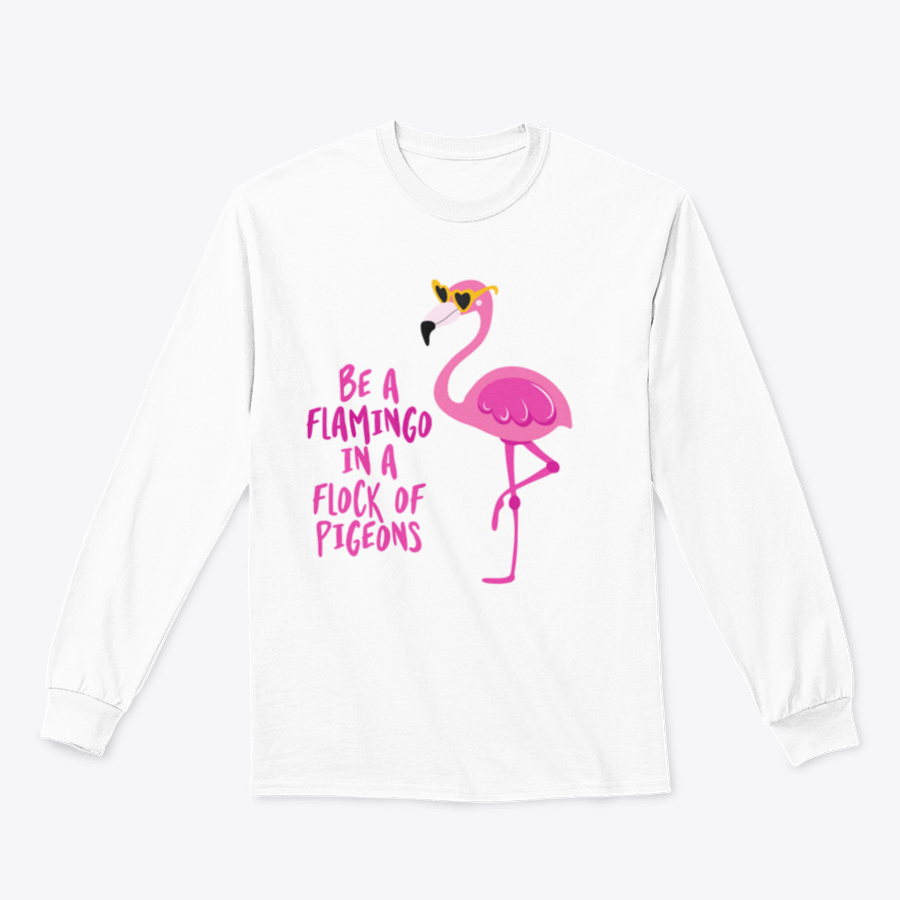 A stylish t-shirt featuring the motivational quote 'Be A Flamingo In A Flock Of Pigeons' in vibrant colors, made from high-quality cotton.