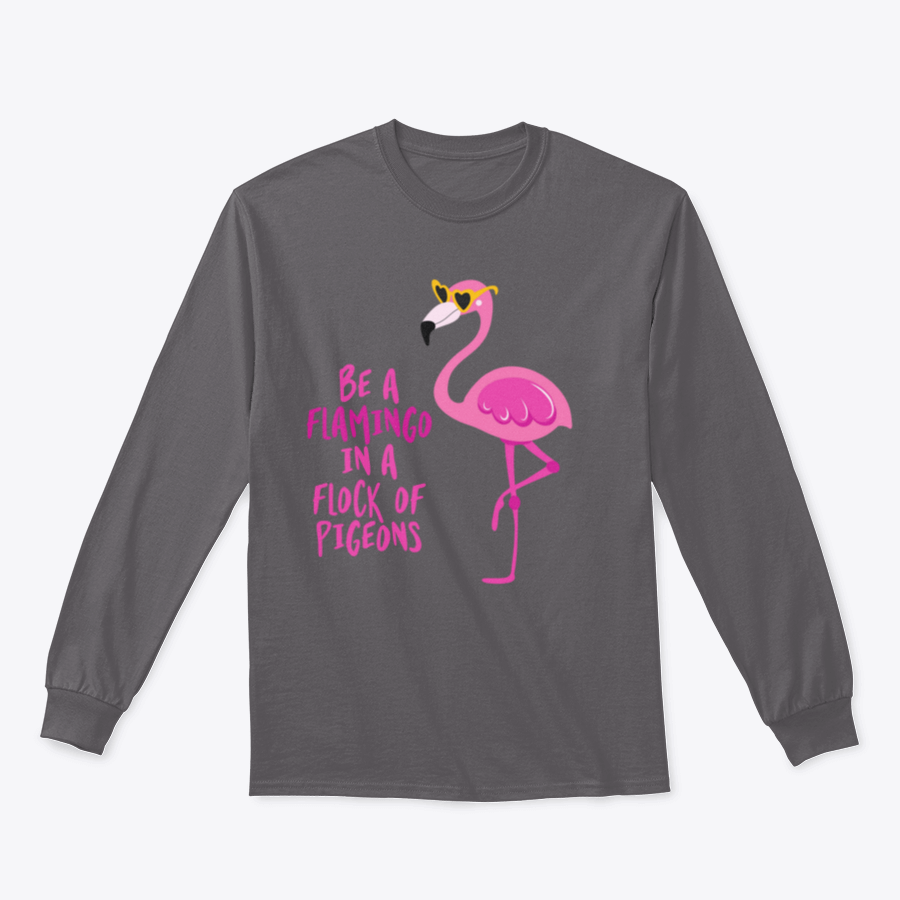 A stylish t-shirt featuring the motivational quote 'Be A Flamingo In A Flock Of Pigeons' in vibrant colors, made from high-quality cotton.