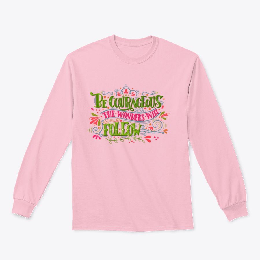 A motivational apparel piece featuring the phrase 'Be Courageous, The Wonders Will Follow' in a stylish design, made from a soft cotton/polyester blend.