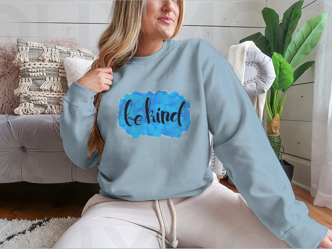 A cozy Be Kind Watercolor Design Sweatshirt featuring a vibrant watercolor print, perfect for casual wear.