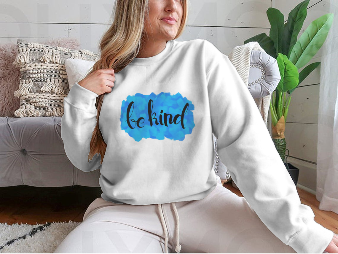 A cozy Be Kind Watercolor Design Sweatshirt featuring a vibrant watercolor print, perfect for casual wear.