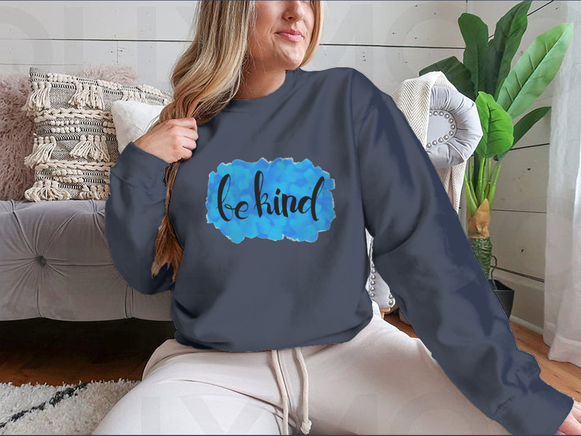 A cozy Be Kind Watercolor Design Sweatshirt featuring a vibrant watercolor print, perfect for casual wear.