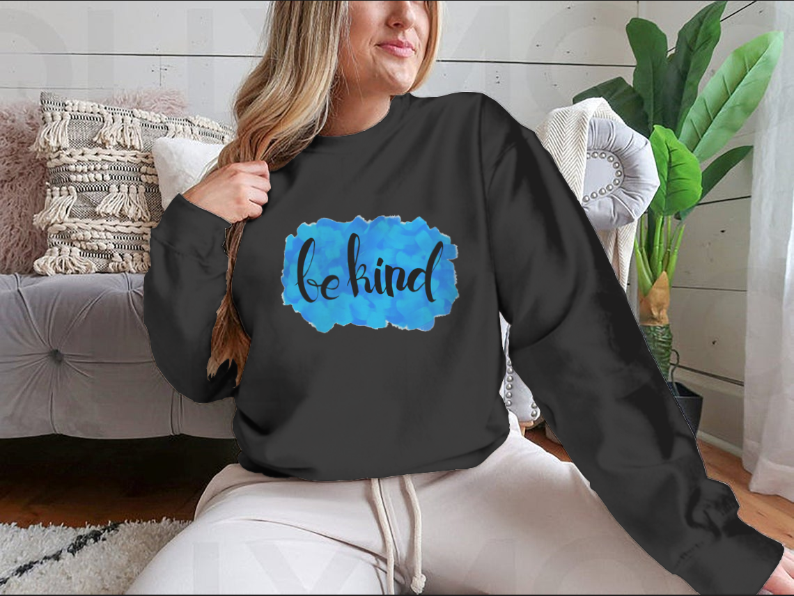 A cozy Be Kind Watercolor Design Sweatshirt featuring a vibrant watercolor print, perfect for casual wear.