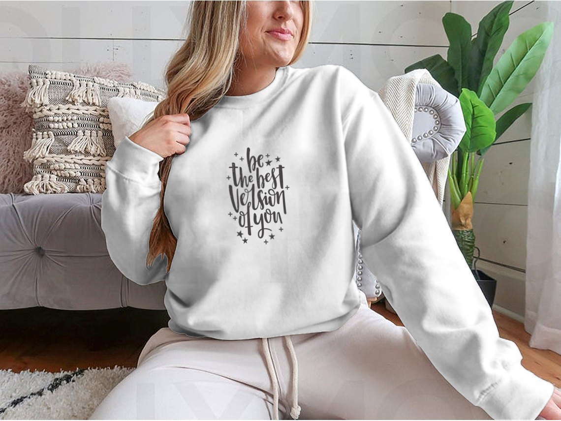 A stylish apparel featuring hand-drawn lettering that reads 'Be The Best Version Of You', showcasing a motivational design on a comfortable fabric.