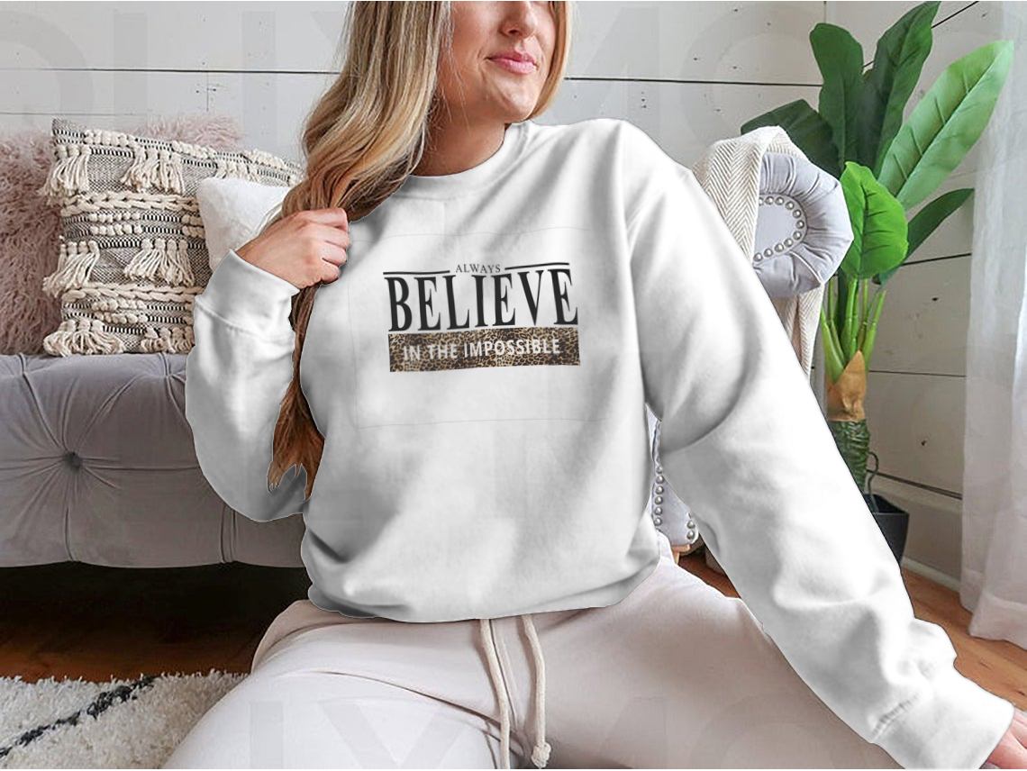 Believe Lettering Word Slogan Design shirt featuring an animal print pattern, made from 100% cotton for comfort.