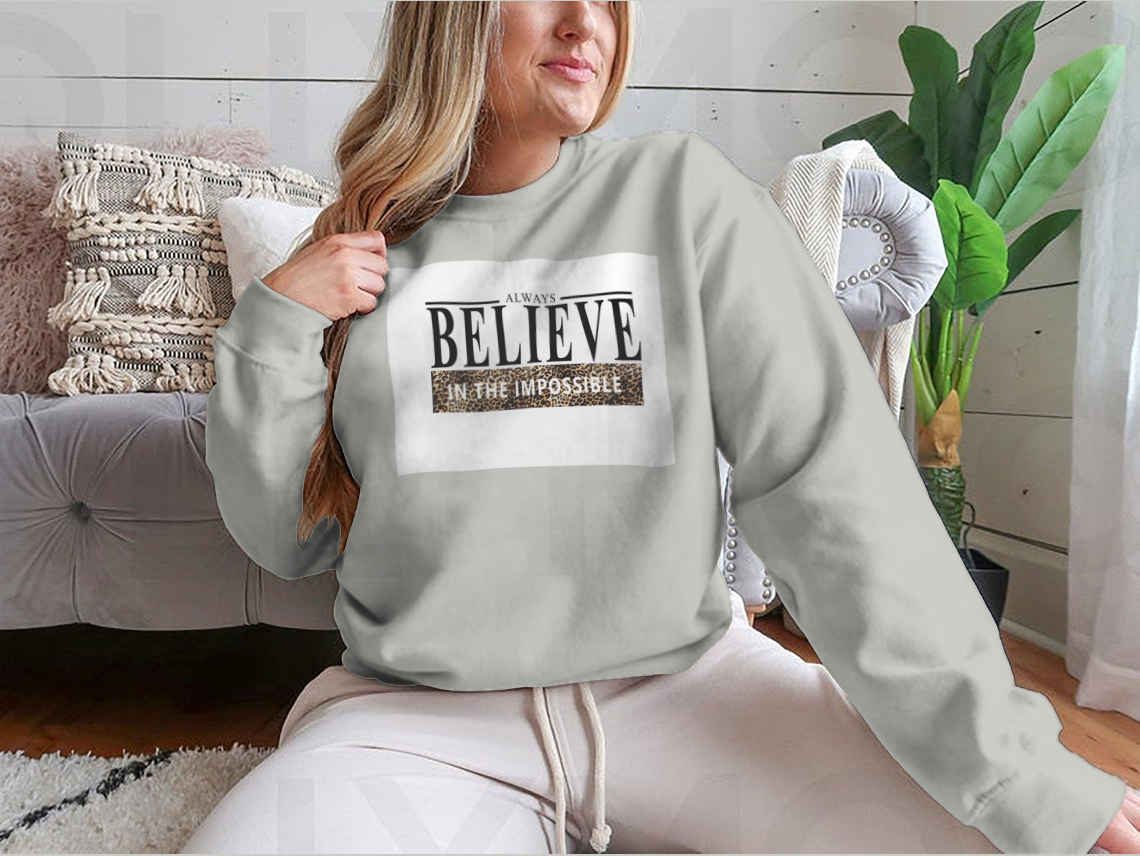 Believe Lettering Word Slogan Design shirt featuring an animal print pattern, made from 100% cotton for comfort.