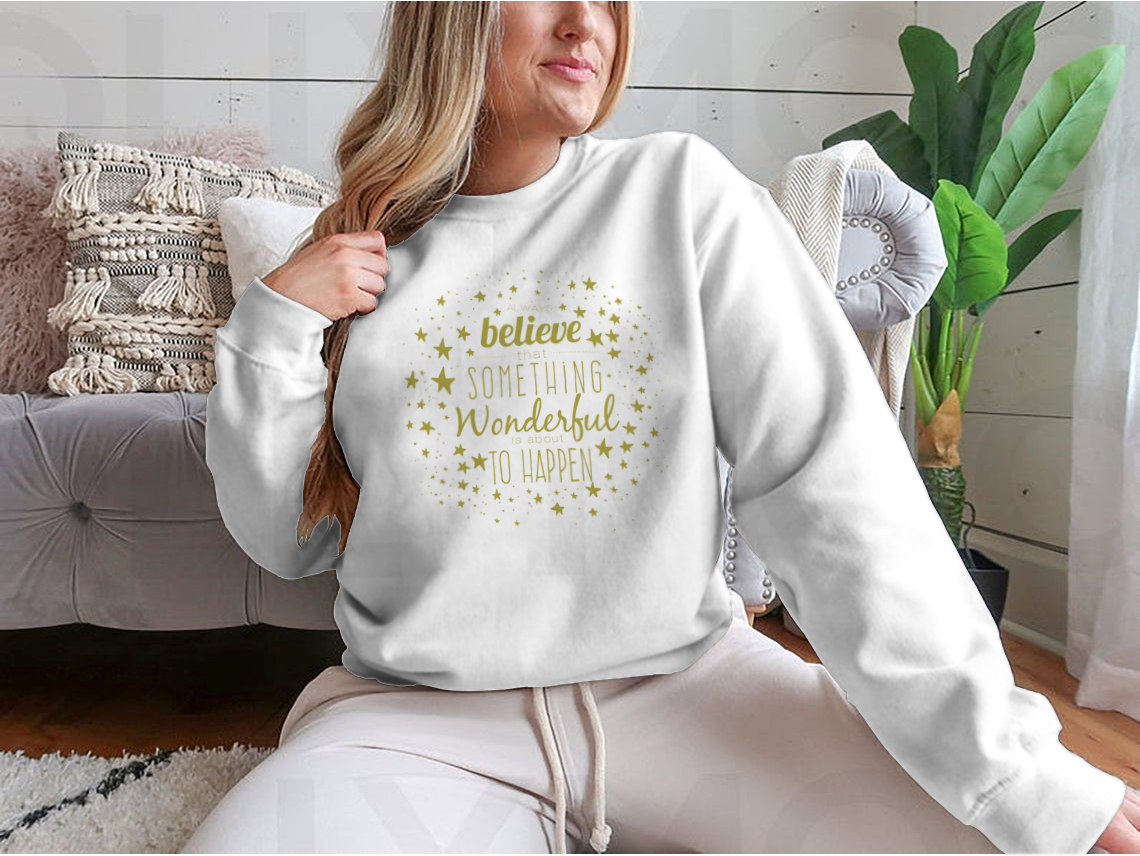 A stylish Believe Something Wonderful To Happen T-Shirt featuring a classic fit and inspirational design, made from a soft cotton-polyester blend.