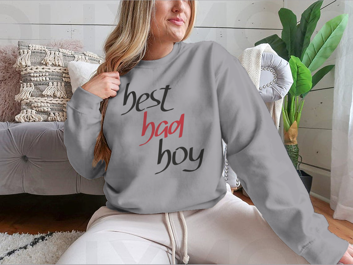 A stylish sweatshirt featuring a unique hand lettering design that reads 'Best Bad Boy', made from a comfortable cotton/polyester blend.