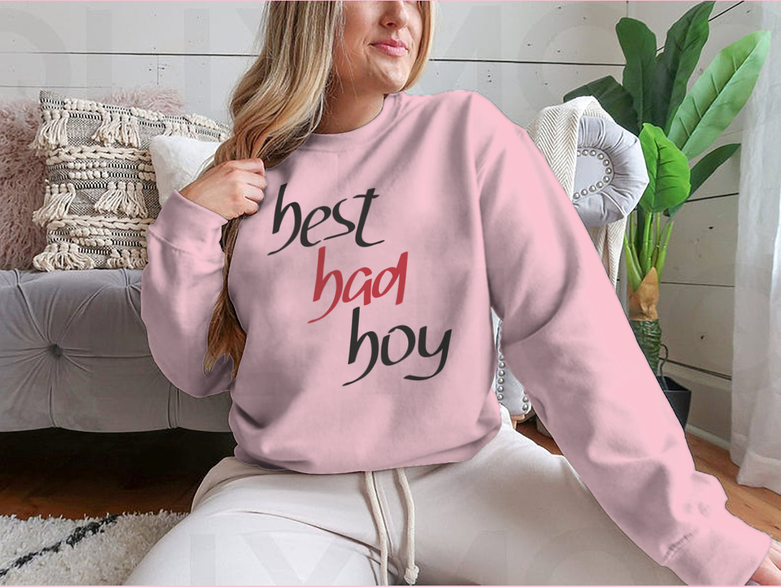 A stylish sweatshirt featuring a unique hand lettering design that reads 'Best Bad Boy', made from a comfortable cotton/polyester blend.