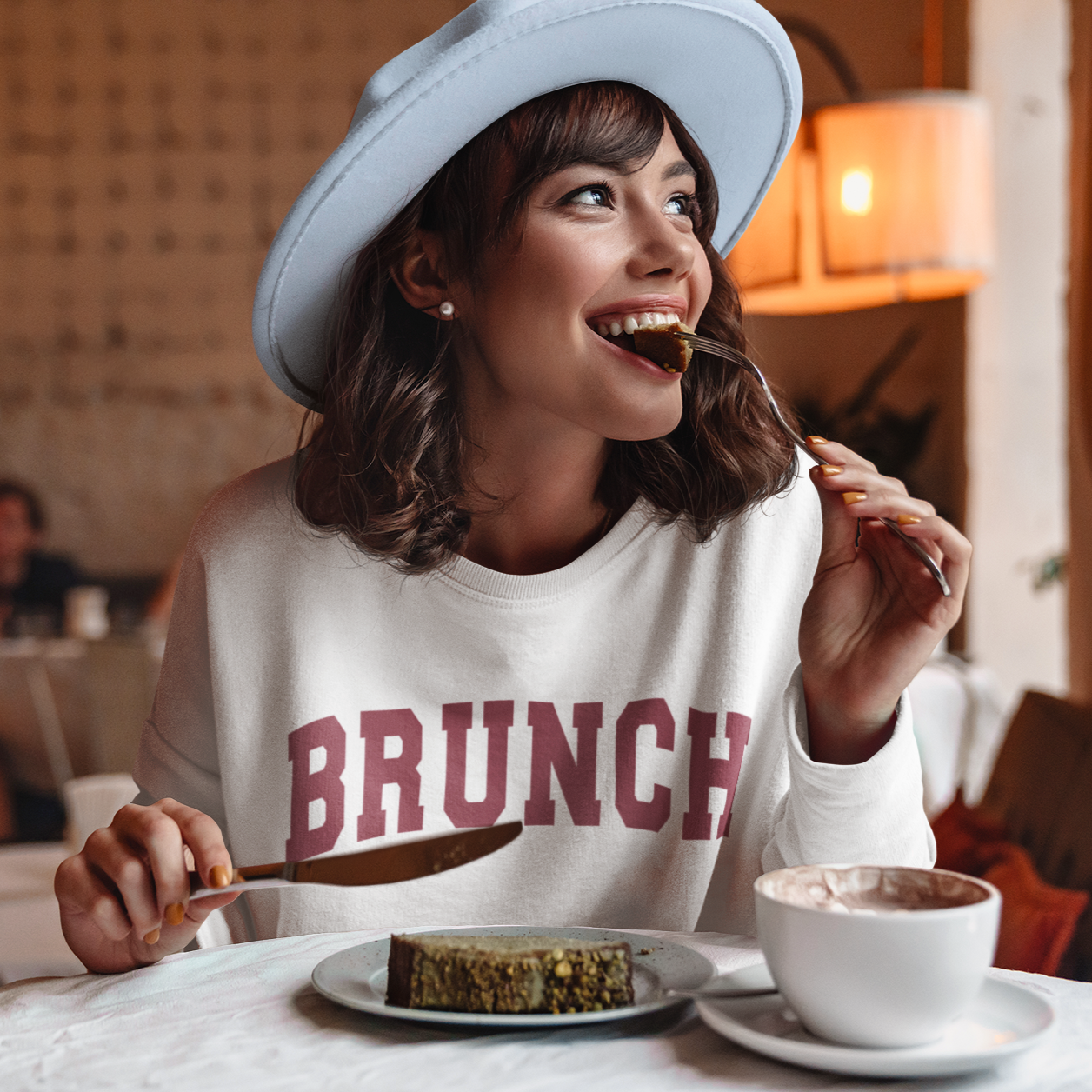 Brunch Organic Unisex Sweatshirt in a cozy setting, showcasing its unisex fit and eco-friendly fabric.