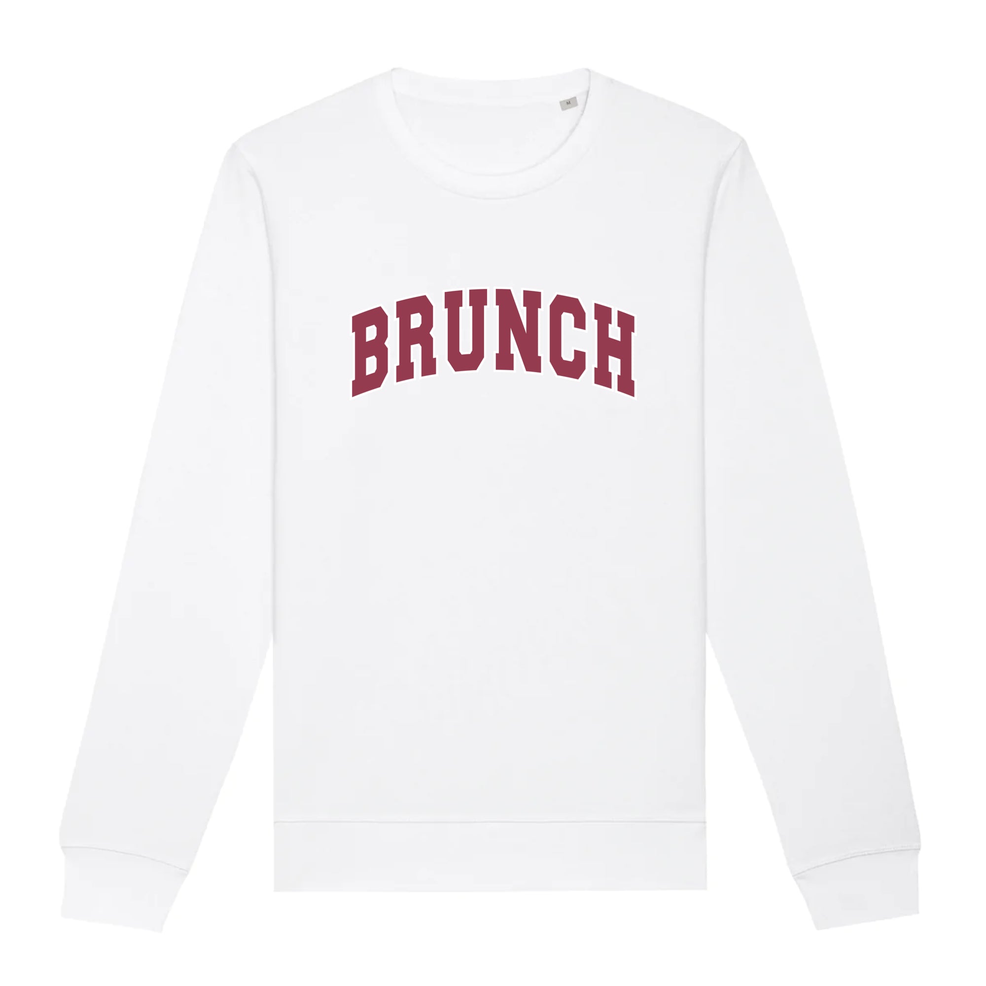 Brunch Organic Unisex Sweatshirt in a cozy setting, showcasing its unisex fit and eco-friendly fabric.