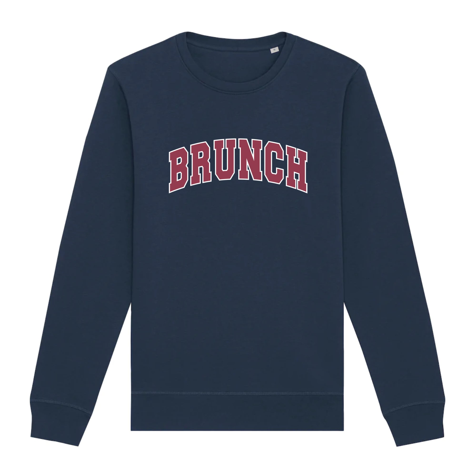 Brunch Organic Unisex Sweatshirt in a cozy setting, showcasing its unisex fit and eco-friendly fabric.