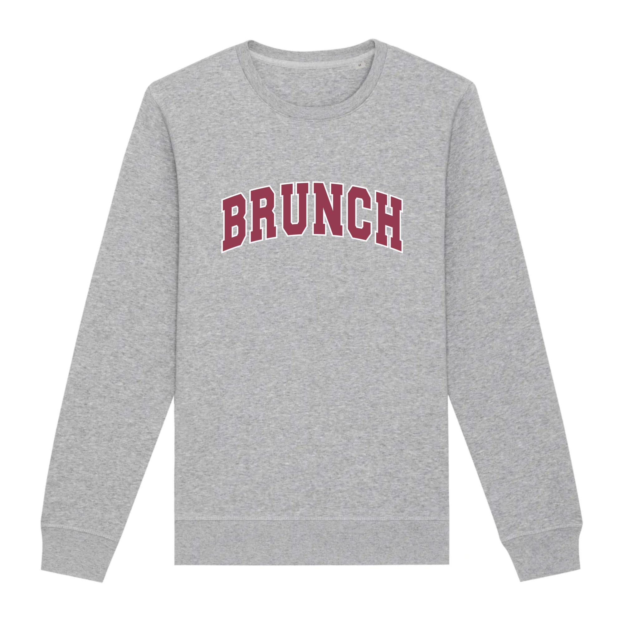 Brunch Organic Unisex Sweatshirt in a cozy setting, showcasing its unisex fit and eco-friendly fabric.