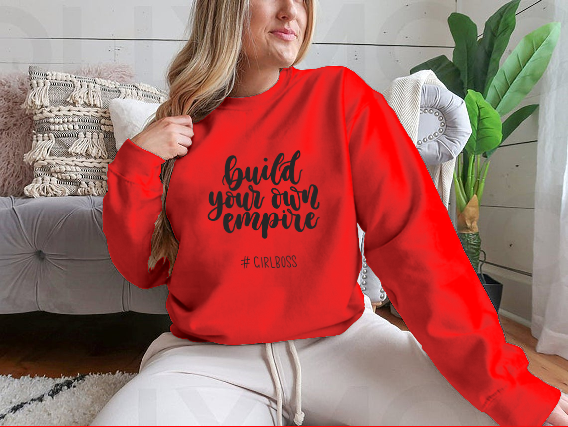 A stylish t-shirt featuring the inspirational quote 'Build Your Own Empire' designed for ambitious women, showcasing a classic fit and soft fabric.