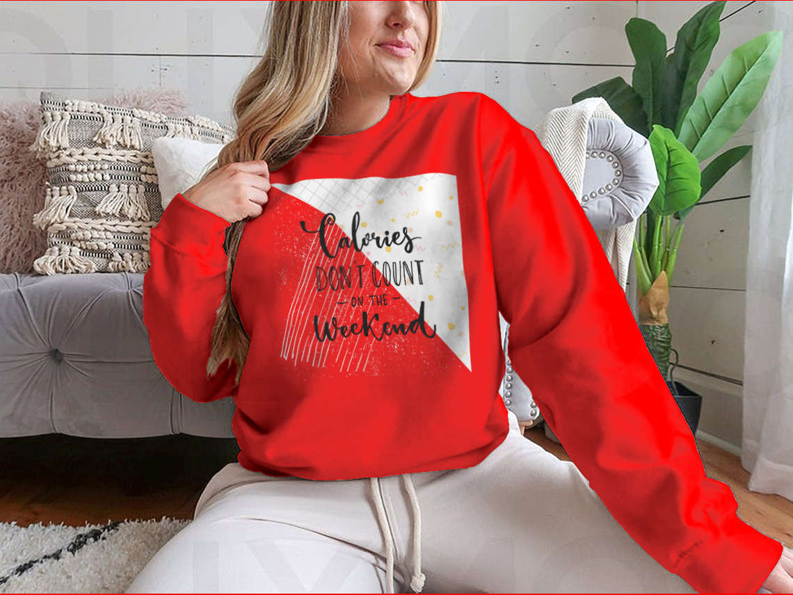 A cozy sweatshirt featuring the phrase 'Calories Don't Count On The Weekend' in a fun design, made from a cotton/polyester blend.