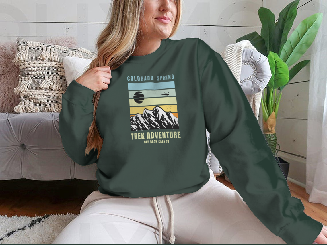 A cozy Colorado Spring Trek Adventure sweatshirt in various colors, showcasing its classic fit and soft fabric.