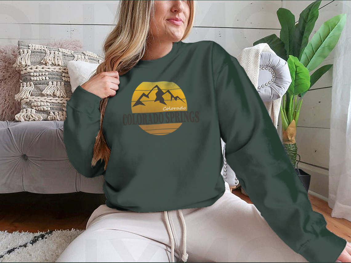 A cozy Colorado Springs Colorado Tourism sweatshirt in various colors, showcasing its classic fit and soft fabric.