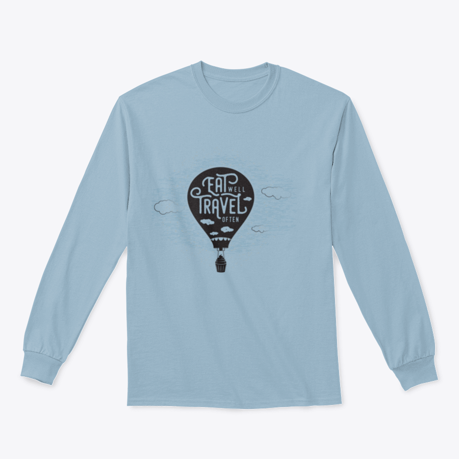 A cozy sweatshirt featuring a cute design of a cupcake riding towards colorful balloons in a bright sky with clouds.