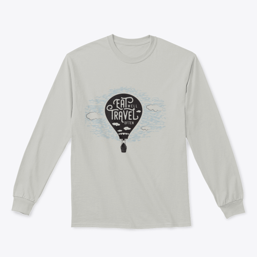 A cozy sweatshirt featuring a cute design of a cupcake riding towards colorful balloons in a bright sky with clouds.