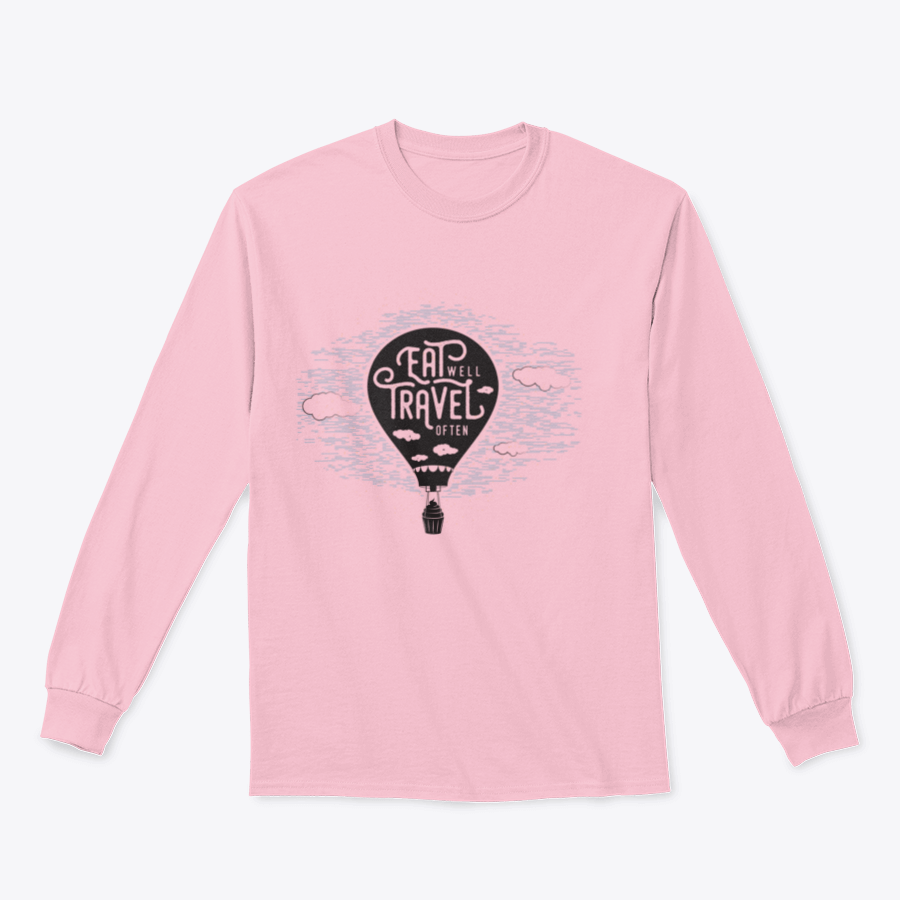 A cozy sweatshirt featuring a cute design of a cupcake riding towards colorful balloons in a bright sky with clouds.