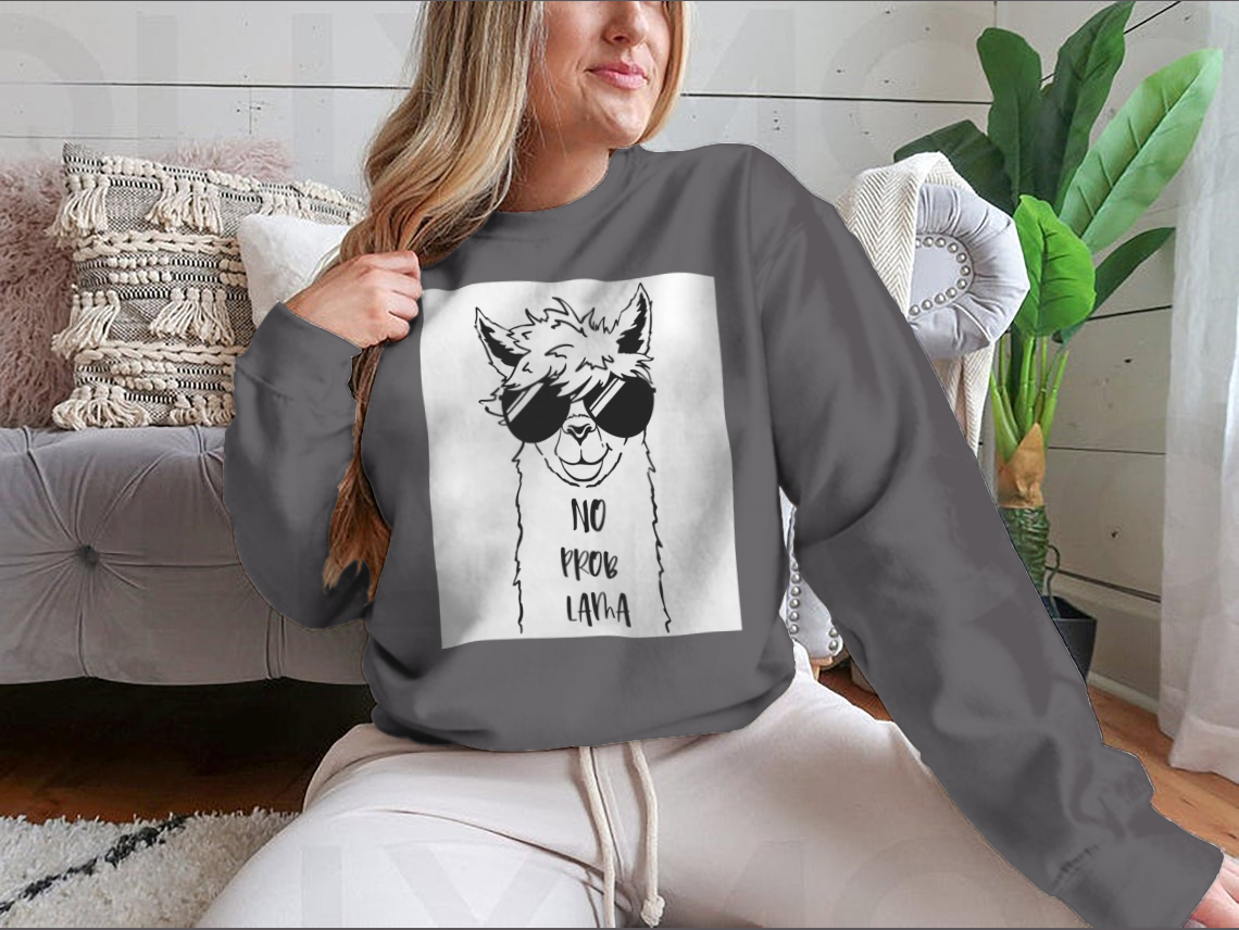 Cute sweatshirt featuring a llama face wearing sunglasses, showcasing a fun and playful design.