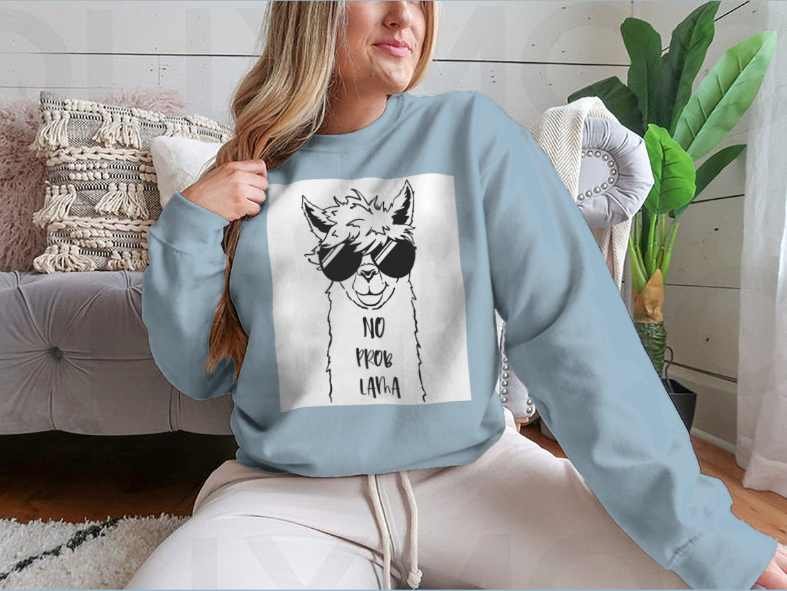 Cute sweatshirt featuring a llama face wearing sunglasses, showcasing a fun and playful design.