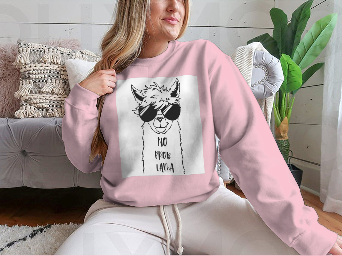 Cute sweatshirt featuring a llama face wearing sunglasses, showcasing a fun and playful design.