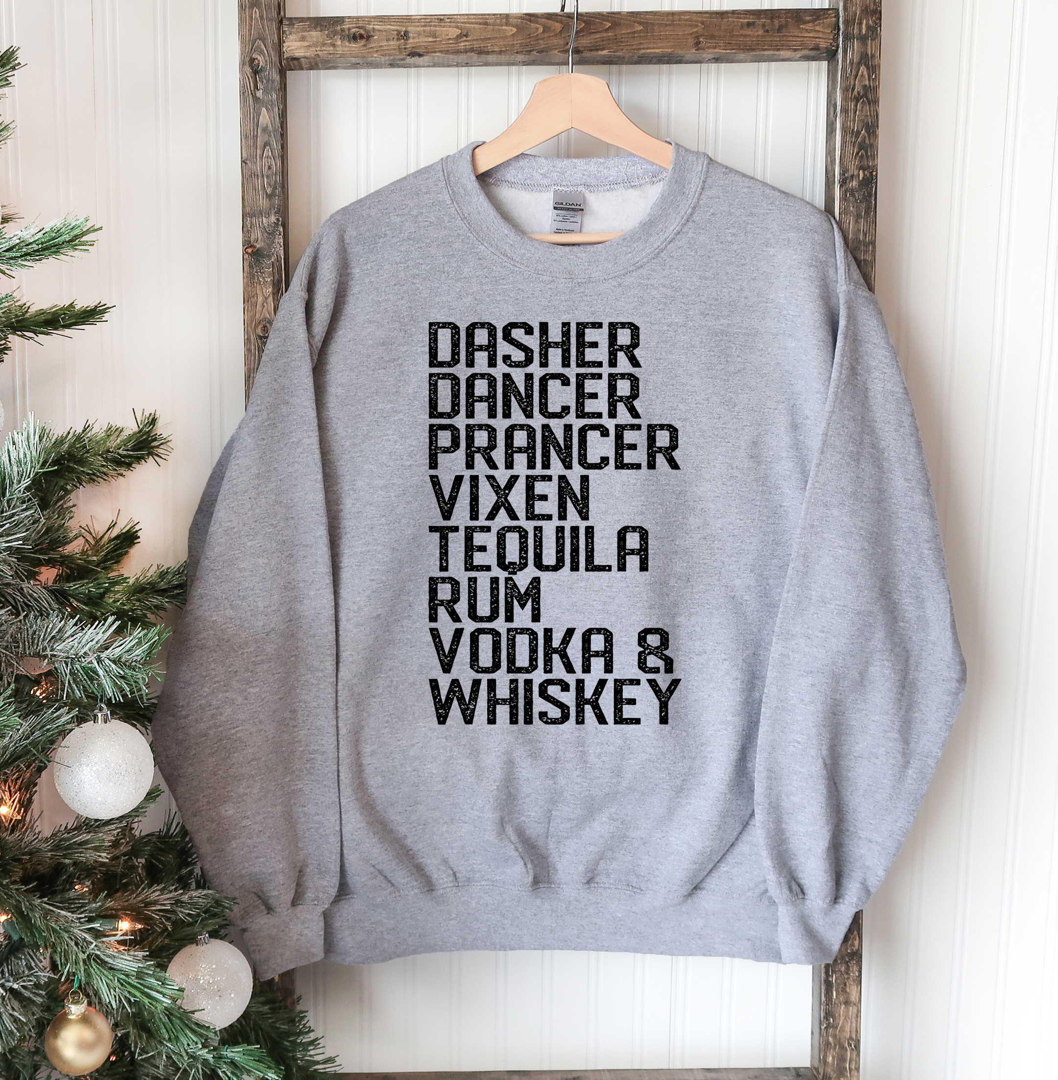 Dasher Dancer Christmas Sweatshirt featuring a festive design with a crew neck and soft fabric, perfect for holiday celebrations.