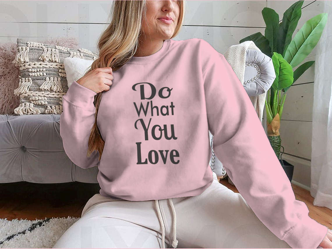 A cozy sweatshirt featuring the inspirational quote 'Do What You Love' in stylish typography, made from soft cotton fabric.