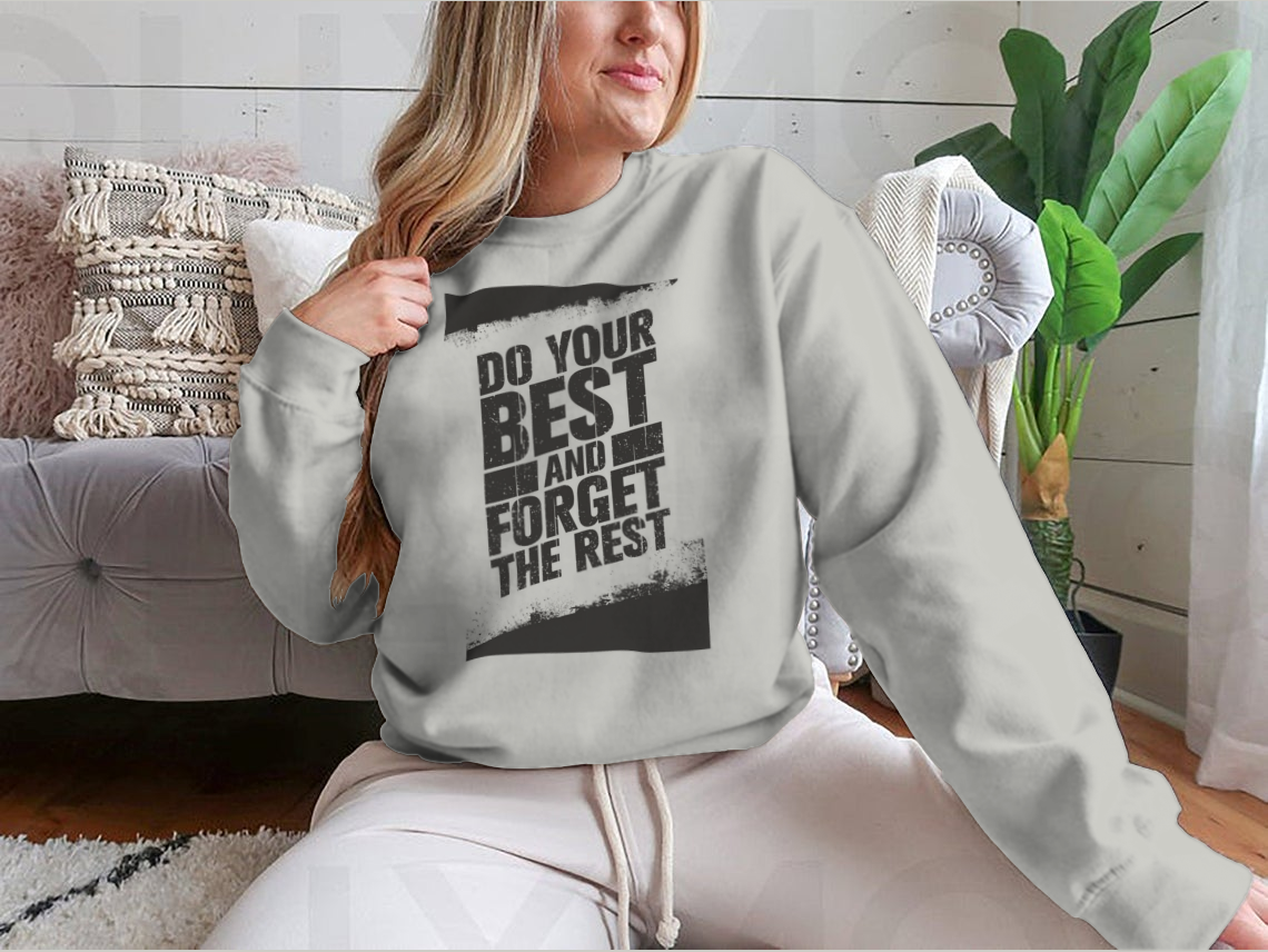 A cozy sweatshirt featuring the motivational phrase 'Do Your Best And Forget The Rest' in stylish typography, made from a soft cotton/polyester blend.