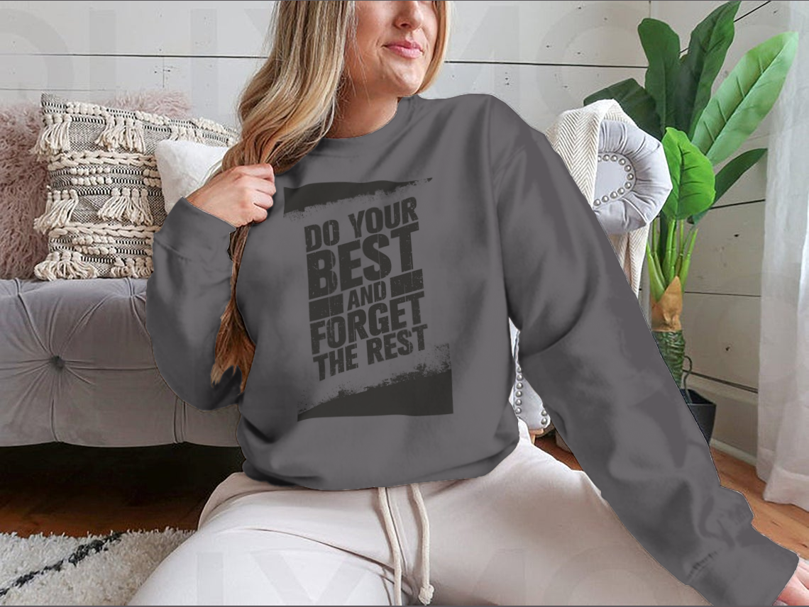 A cozy sweatshirt featuring the motivational phrase 'Do Your Best And Forget The Rest' in stylish typography, made from a soft cotton/polyester blend.