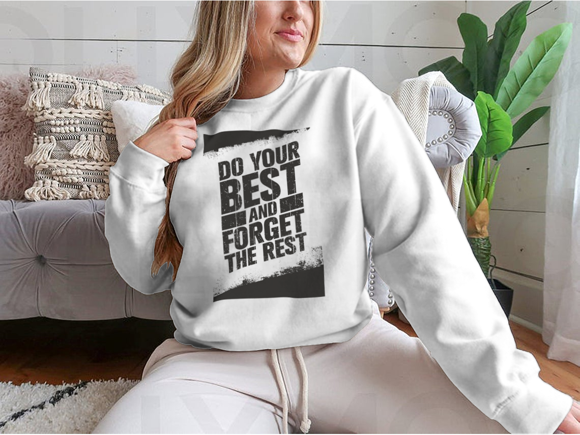 A cozy sweatshirt featuring the motivational phrase 'Do Your Best And Forget The Rest' in stylish typography, made from a soft cotton/polyester blend.