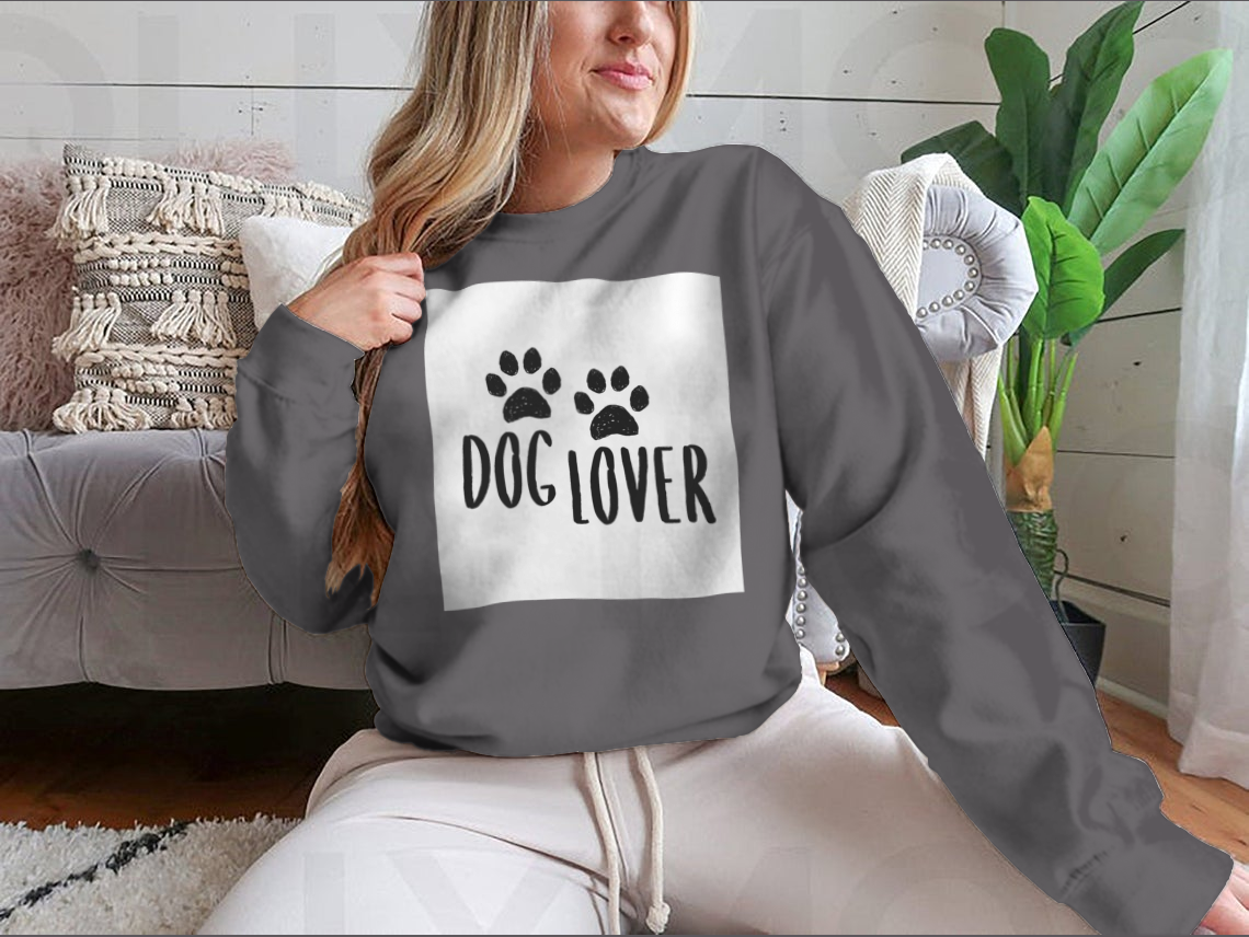 A stylish Dog Lover Cartoon Typography shirt featuring a playful dog paws silhouette design, perfect for dog enthusiasts.