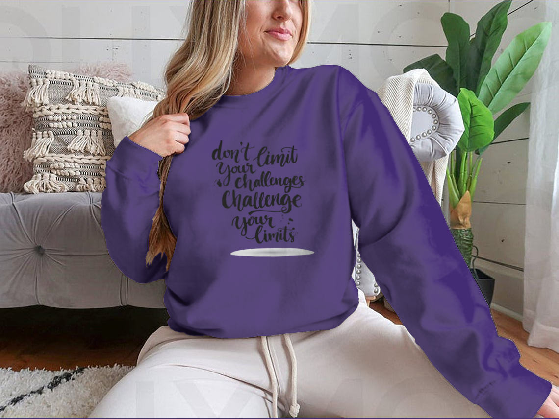 A comfortable cotton-polyester blend shirt featuring the motivational phrase 'Don't Limit Your Challenges, Challenge Your Limits' in bold lettering.