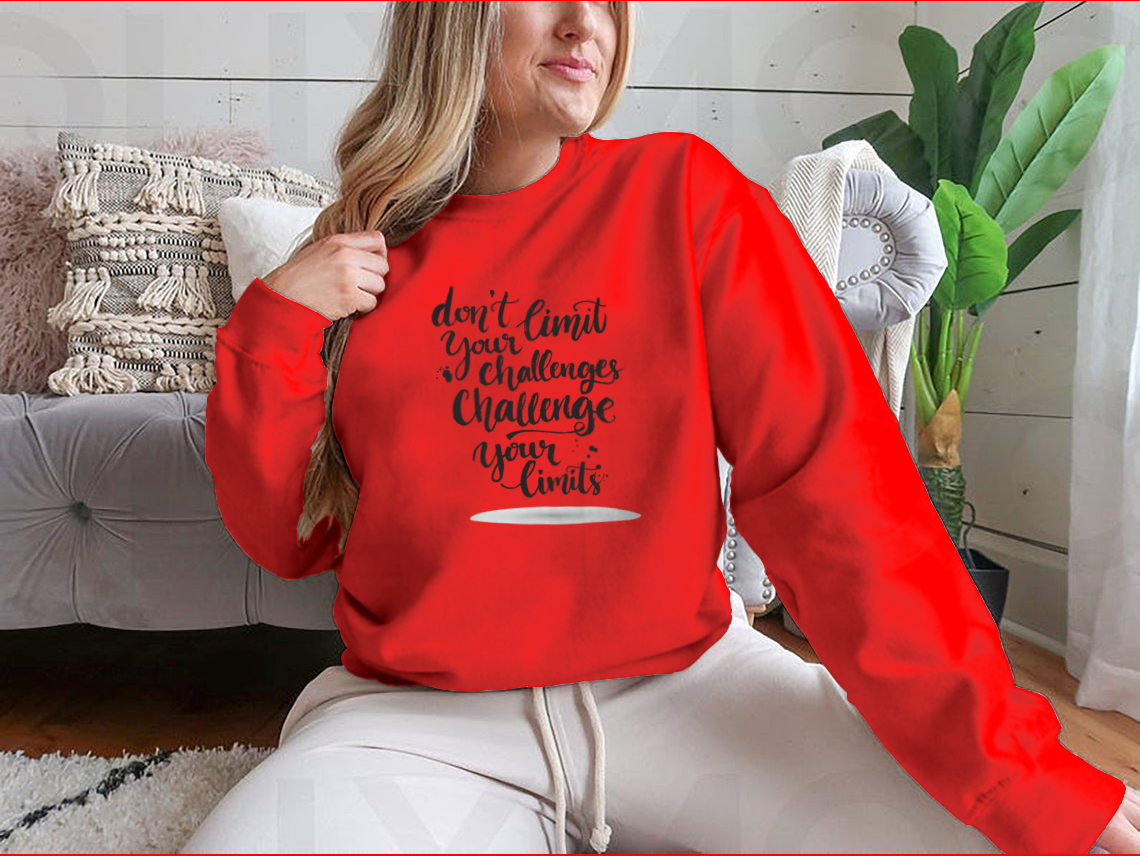 A comfortable cotton-polyester blend shirt featuring the motivational phrase 'Don't Limit Your Challenges, Challenge Your Limits' in bold lettering.