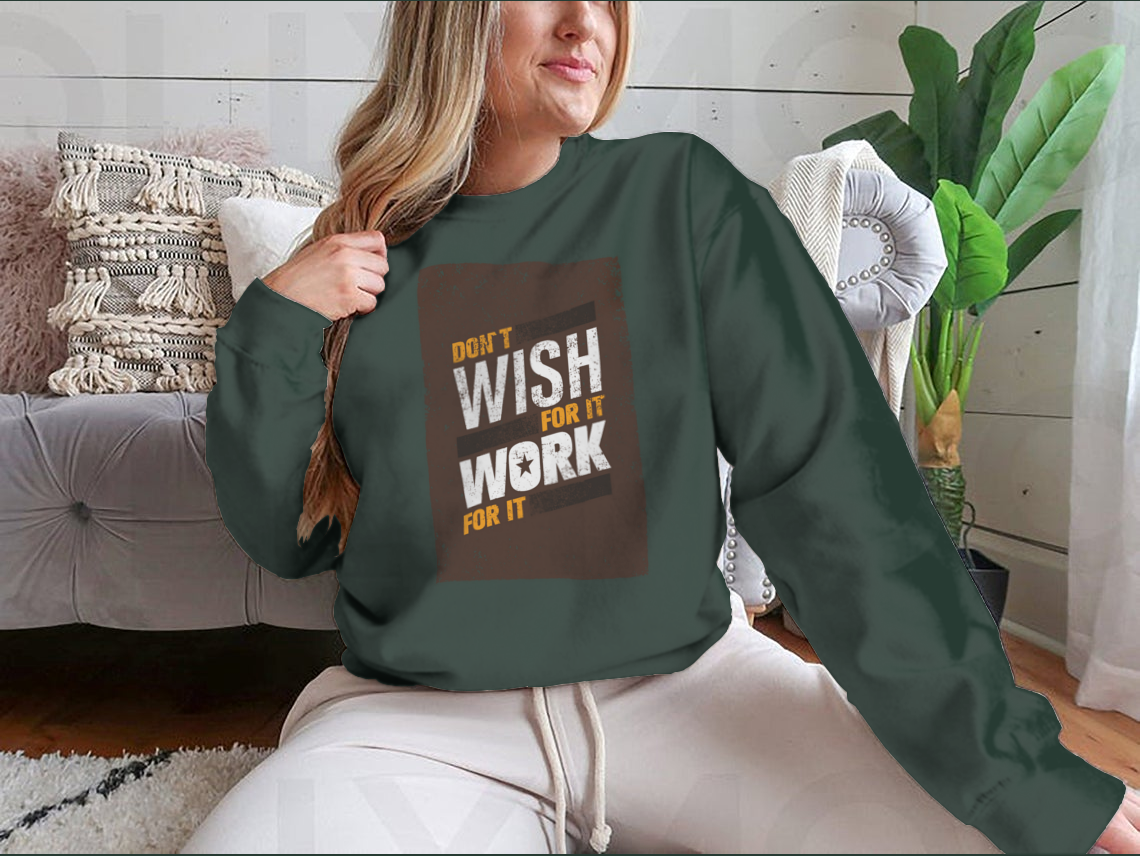 A stylish sweatshirt featuring the motivational quote 'Don't Wish For It, Work For It' in bold lettering, made from a soft cotton-polyester blend.